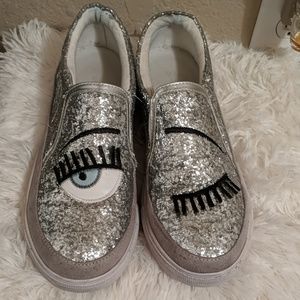 Silver glitter slip on winking sneakers
